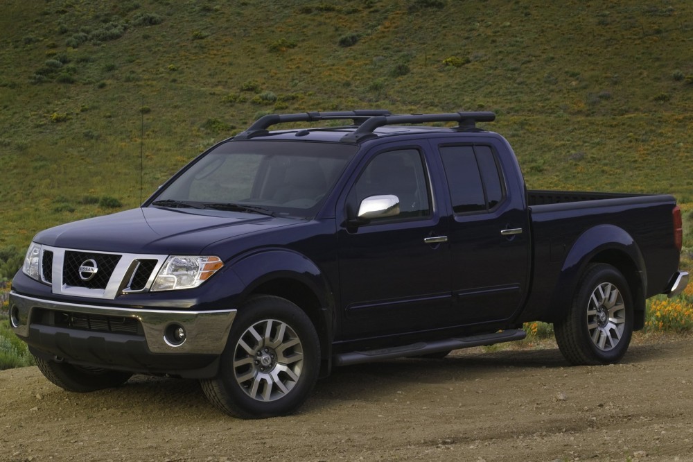 2012 Nissan Frontier in a field