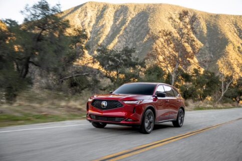 Red Acura MDX with torque vectoring driving